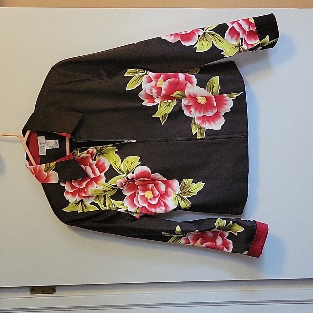 Beautiful brown with flowers jacket.